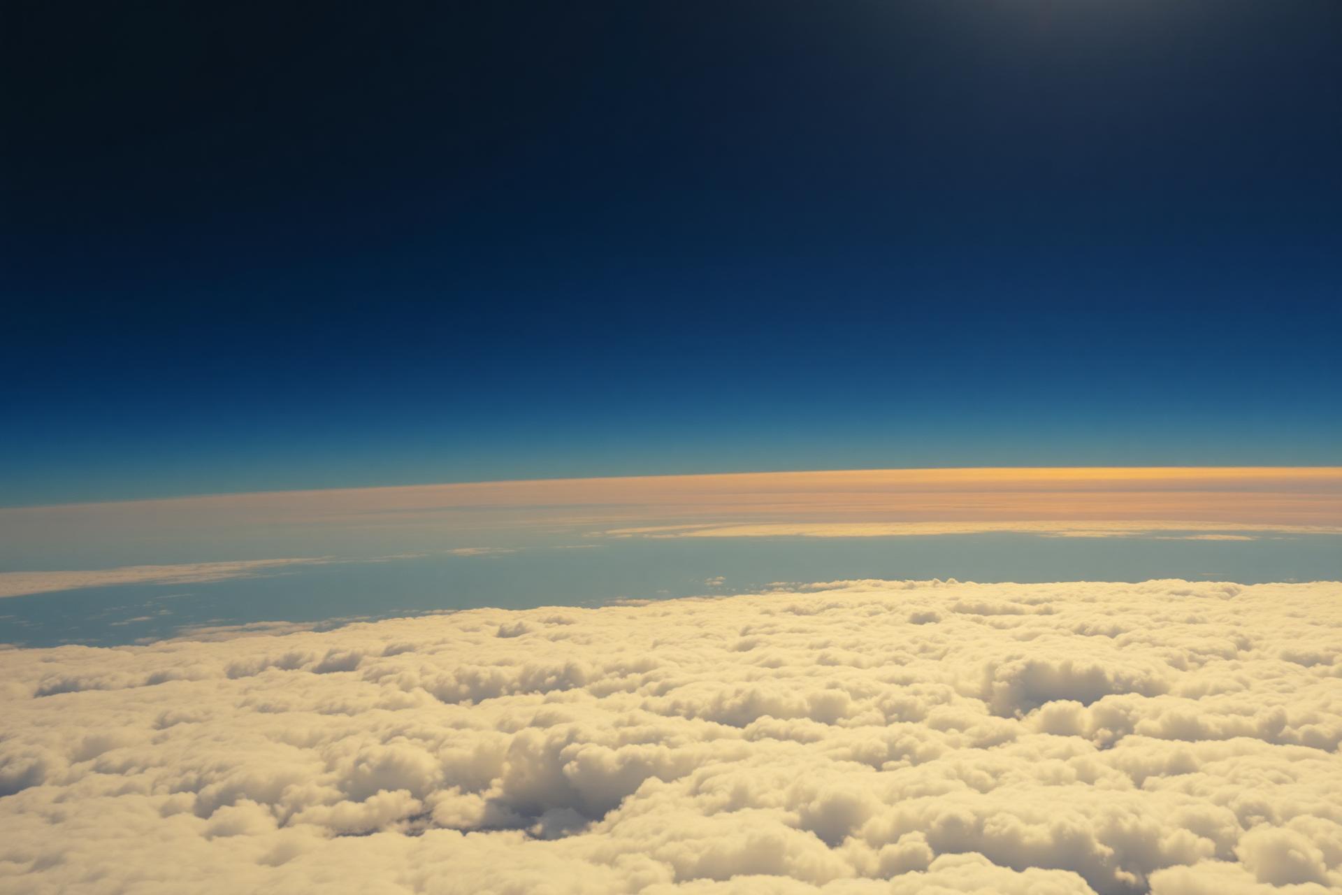 Cloudscape seen from high altitude at sunrise